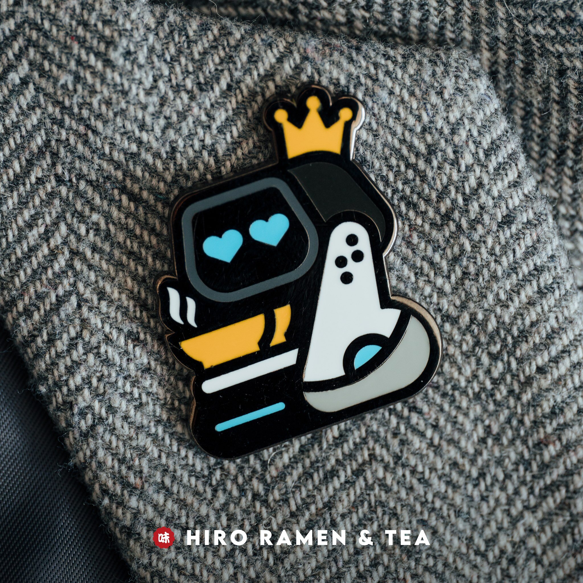 Our TARS hard enamel pin will be available in our merch shop at Hiro Ramen &amp; Tea starting tomorrow, stop by and pick one up! Have a warm rich bowl of ramen and refreshing tea while you're at it! Welcome to the weekend, everyone! 🙏🙏🙏.

#columbu