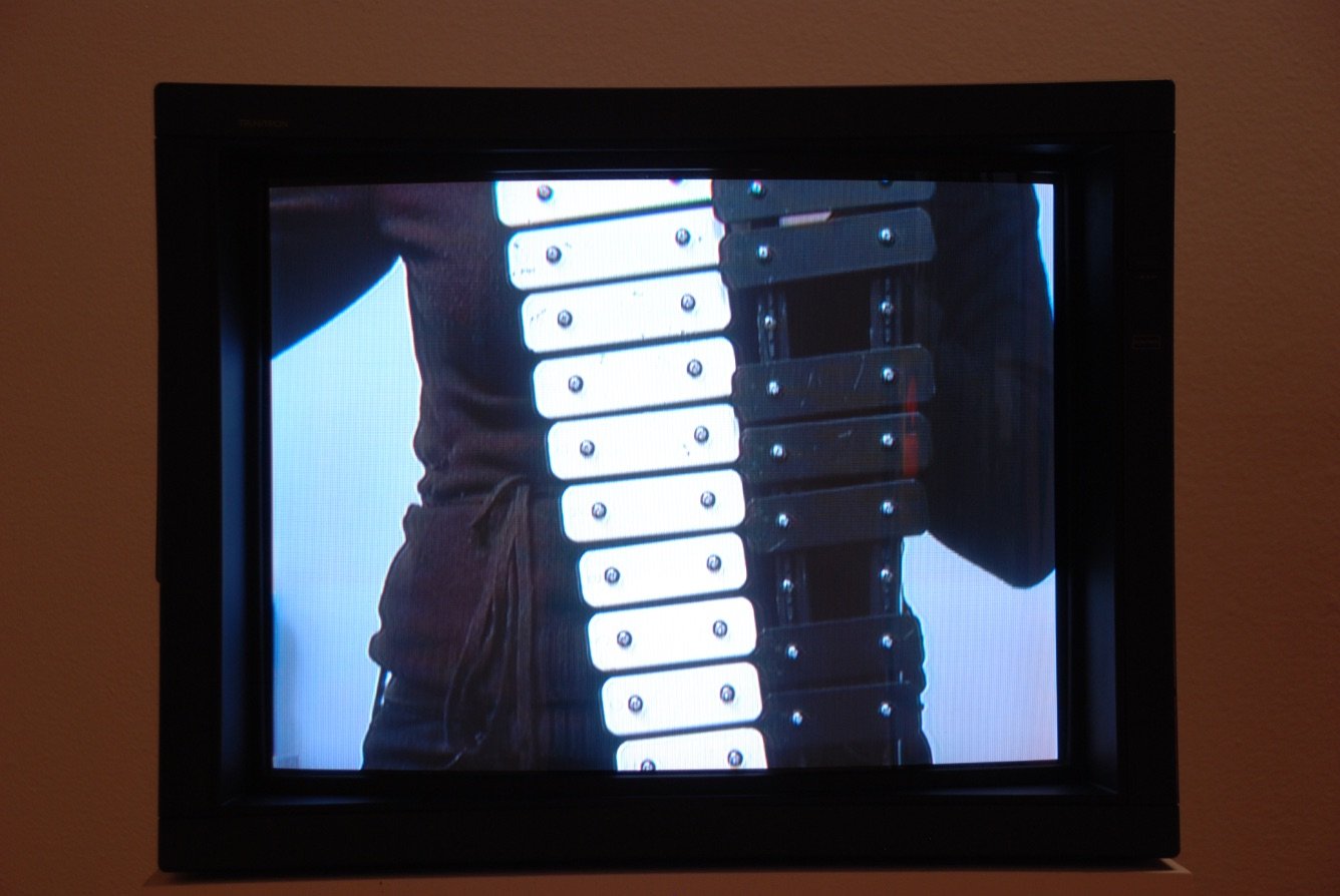 Caroline Dubois plays a music instrument on video. Photo: Paul Litherland / Galerie Leonard & Bina Ellen