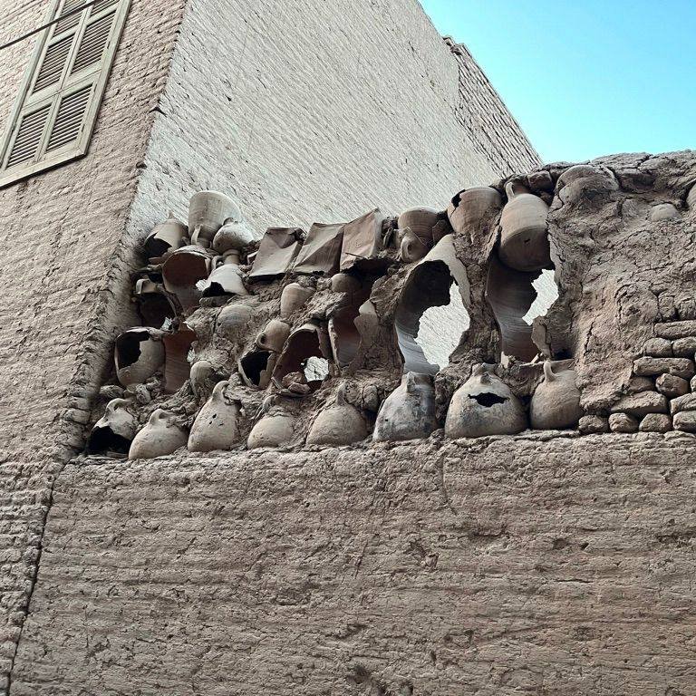 Wall pot infills, used as "pigeon houses" in Naqada, Egypt (Image source: Beit Zaman, the Old and Forgotten. Photographer: Luciana Carvalho)  - Lola Ben-Alon