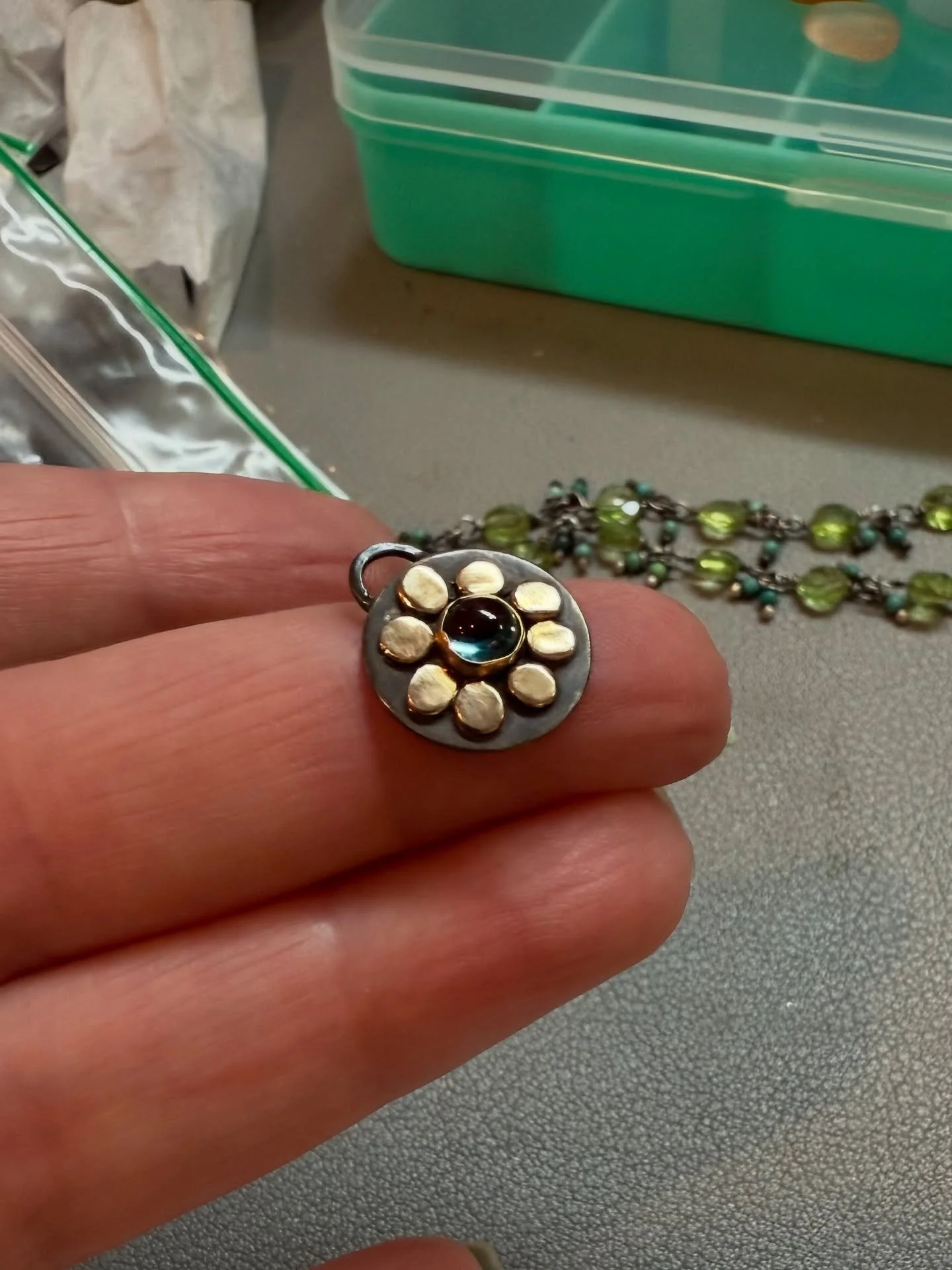 I can&rsquo;t believe I forgot about this little guy. I made this probably two years ago and just found it in my sea glass stash. Tiny London blue topaz set in sterling silver with 14k accents. 💙💛
#metalsmith #handmadejewelry #charmobsessed #nichol