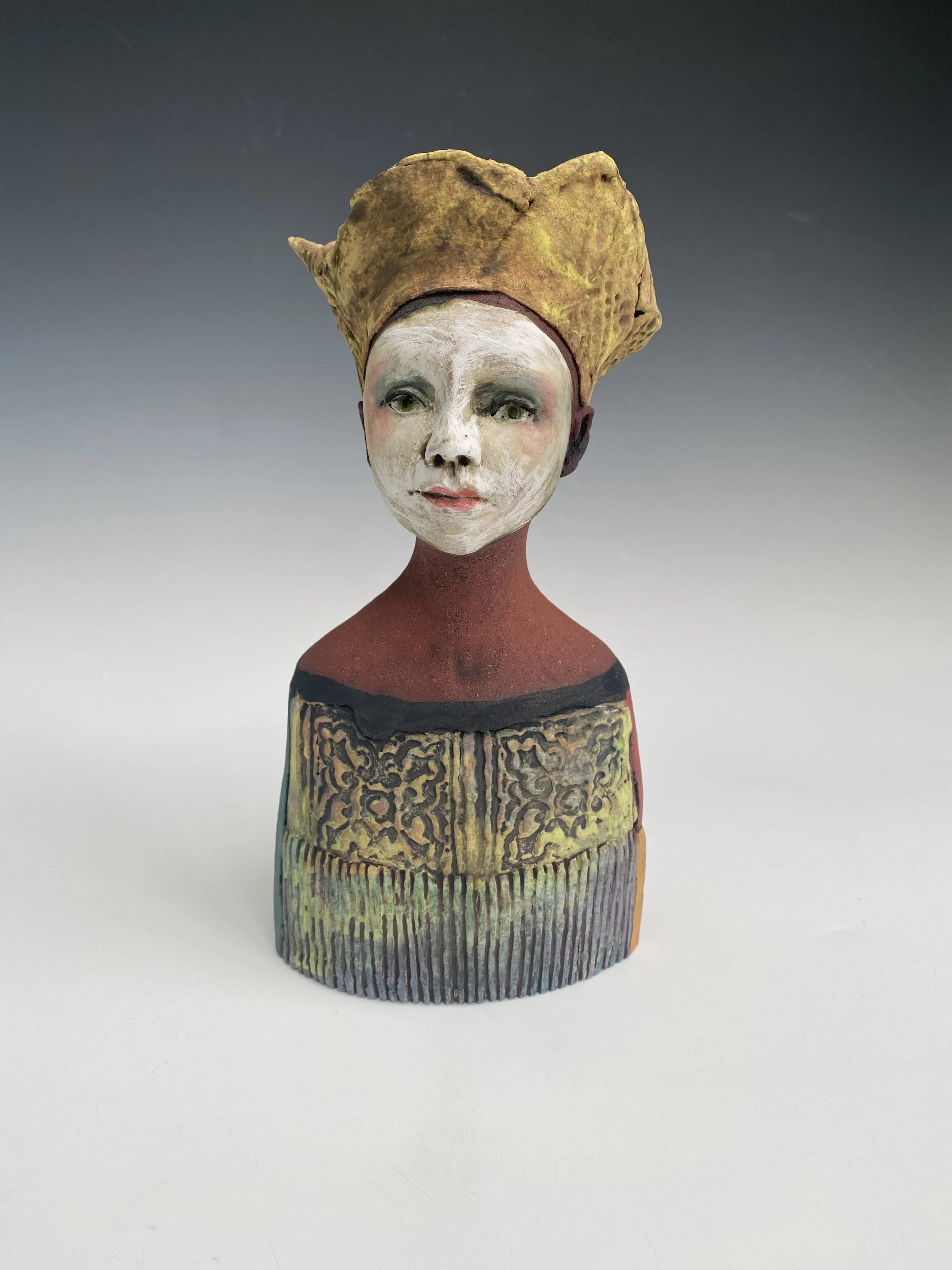 Medium red clay bust/yellow hat- Height23cm