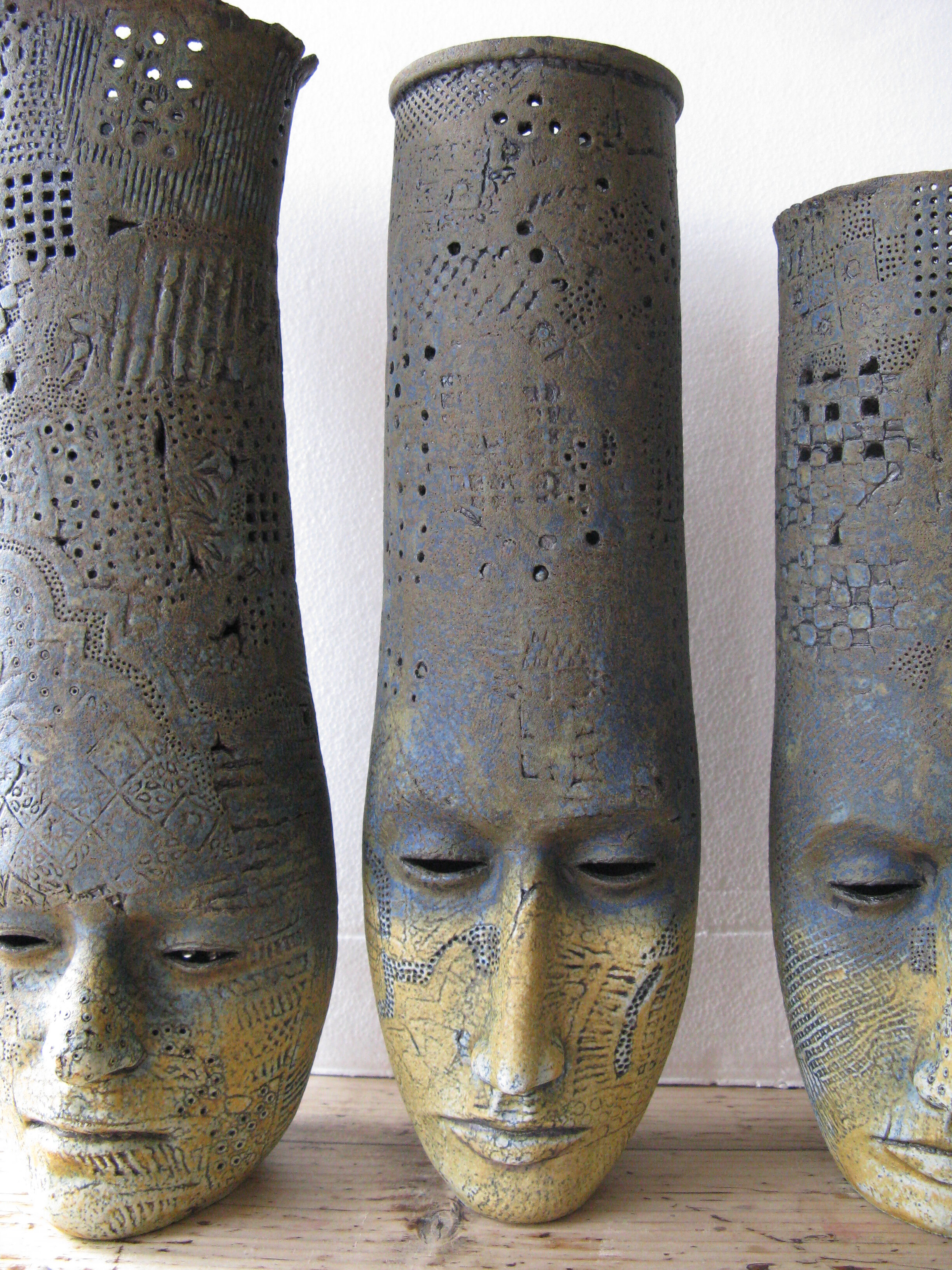two faced head pots ht. 36cm40-35cm.JPG