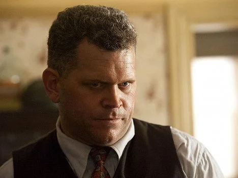 John Batchelor as Wally Tomlinson in the Nine Network series Underbelly Razor