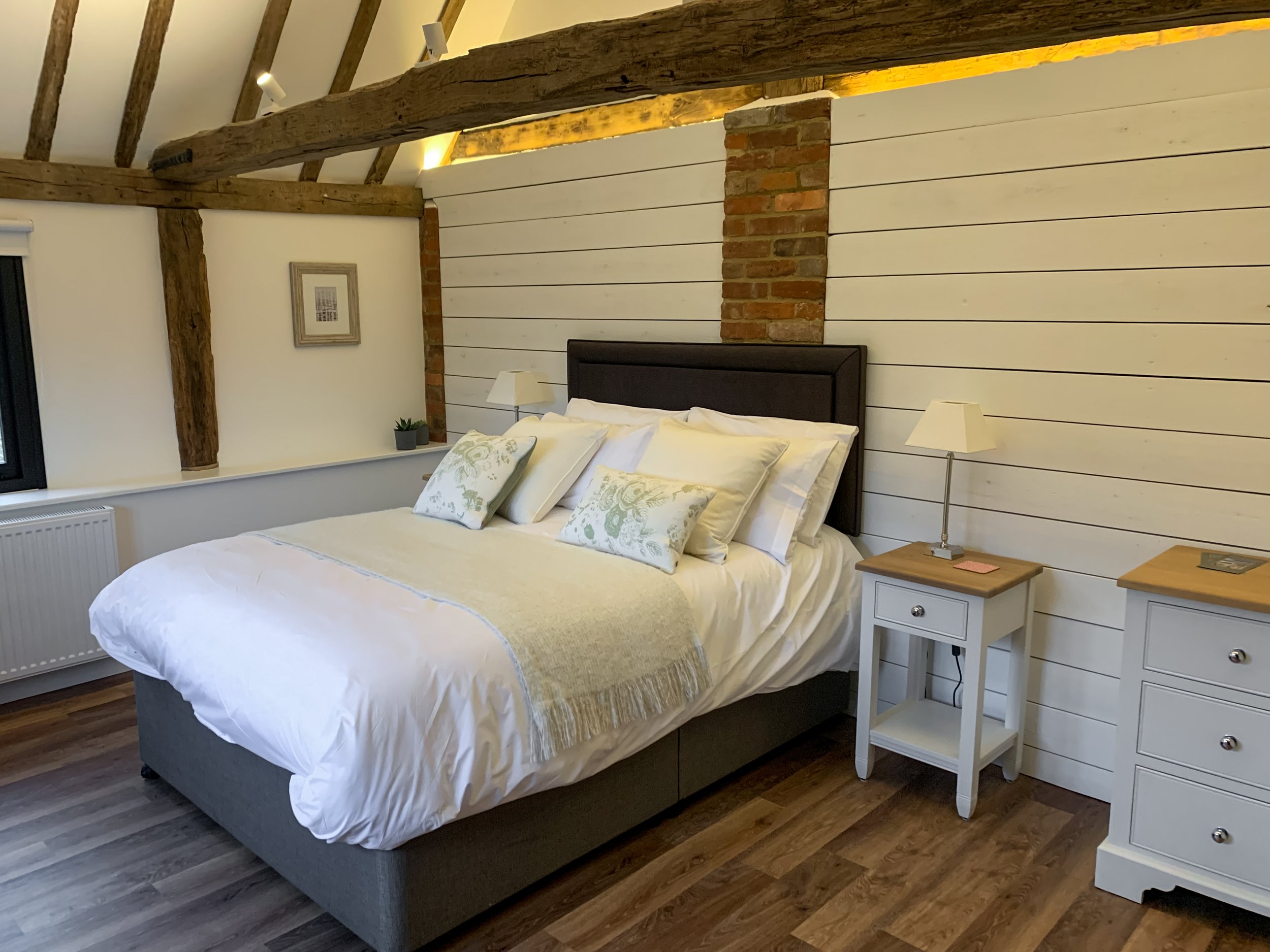 Large bedrooms in the stable block at Elvey Farm Country Hotel 