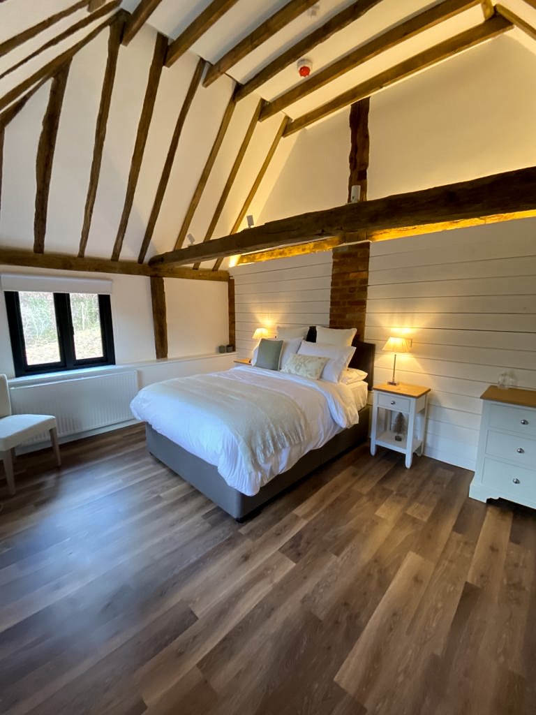 Vaulted period ceilings in the largest suite at Elvey Farm Kent 