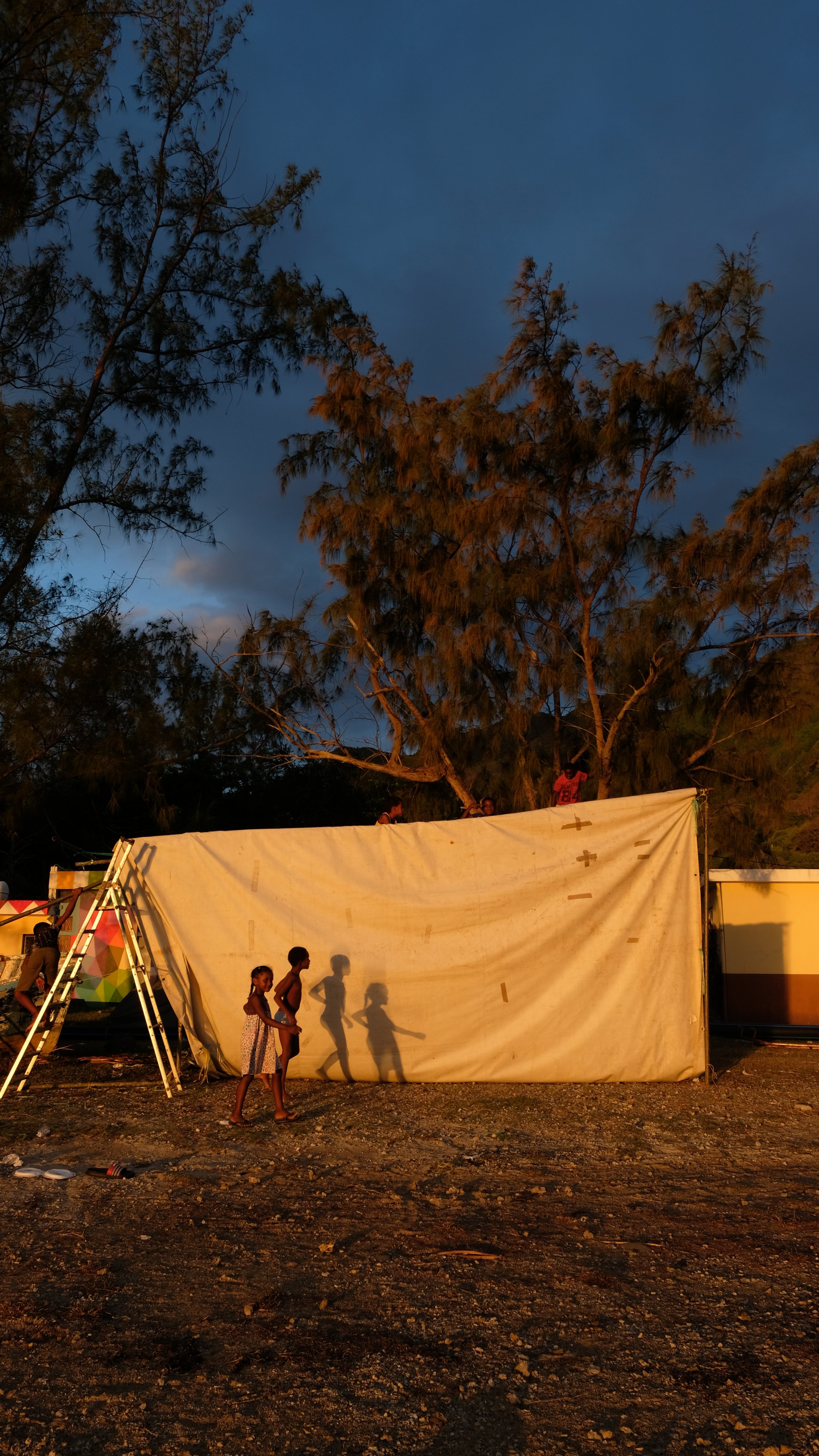 My friend was calling me to look at the sunset, so I had to rush through the session. The sunset was beautiful, but I forgot much about it because the kids were the center of my attention. 