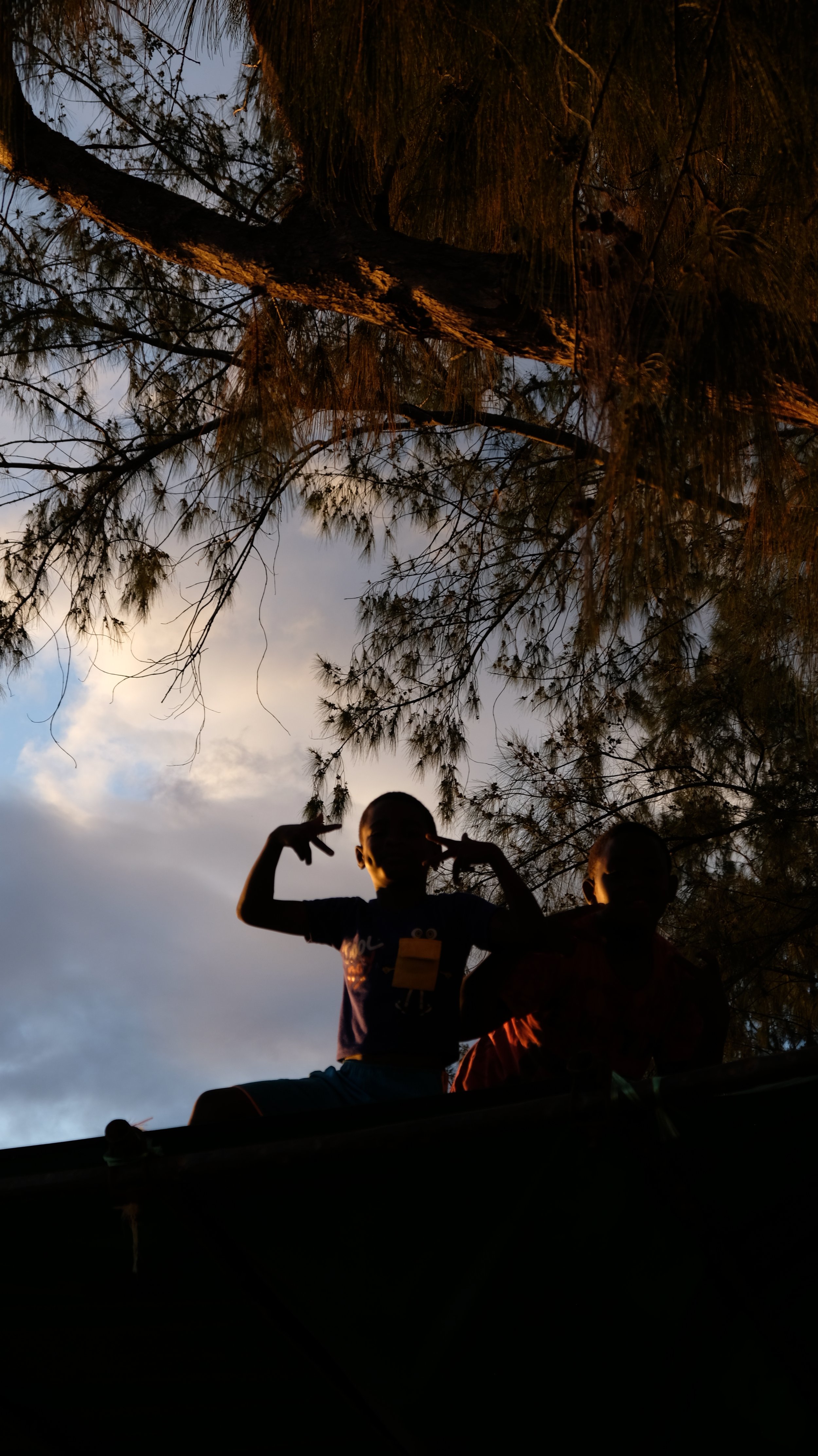 I got stopped by some kids who were climbing the tent. I thought they were neighborhood kids hanging out together. They spotted my camera, and got super excited, “un photo madame! Un photo madame!” 