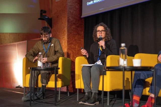 Ligia Bouton speaking at the CERN Art and Science Summit 2025.