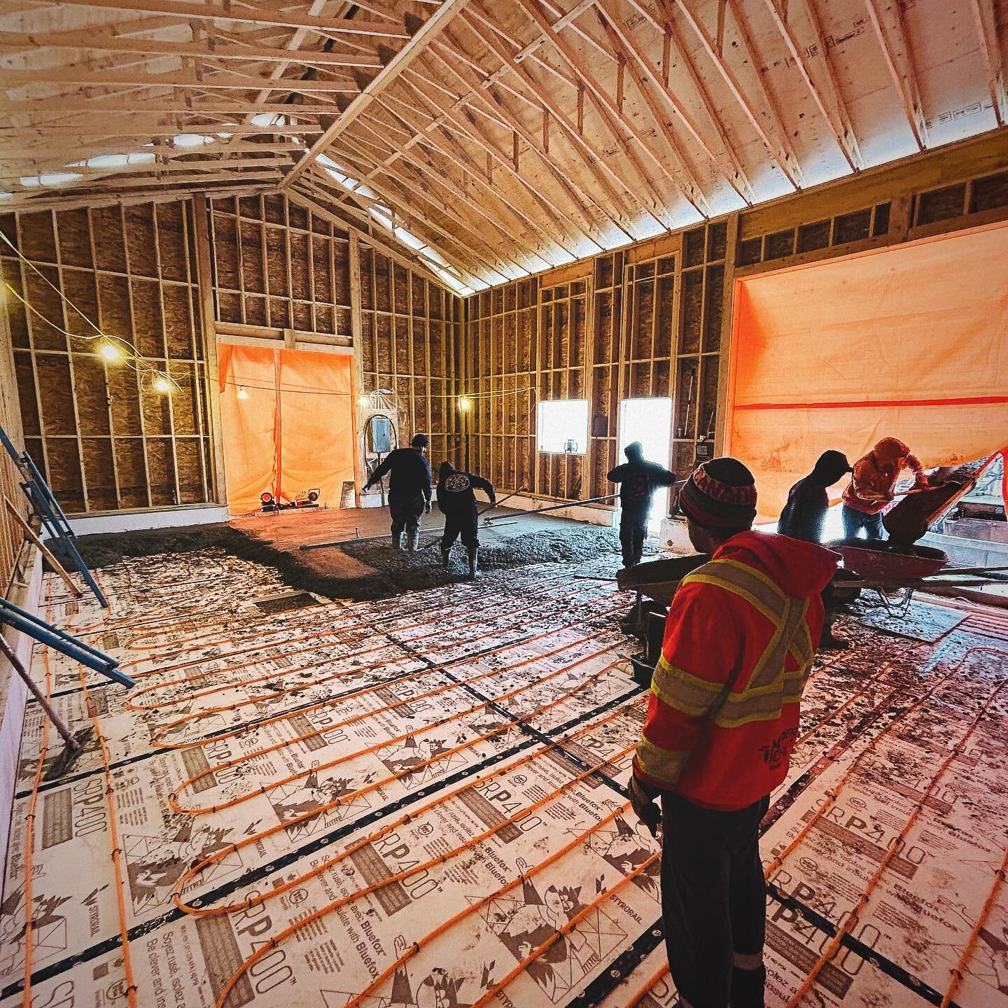 It's orange tarps season. We did this garage's foundation in the summer. #constructionottawa #ottawahomebuilders #cavanaghconstruction