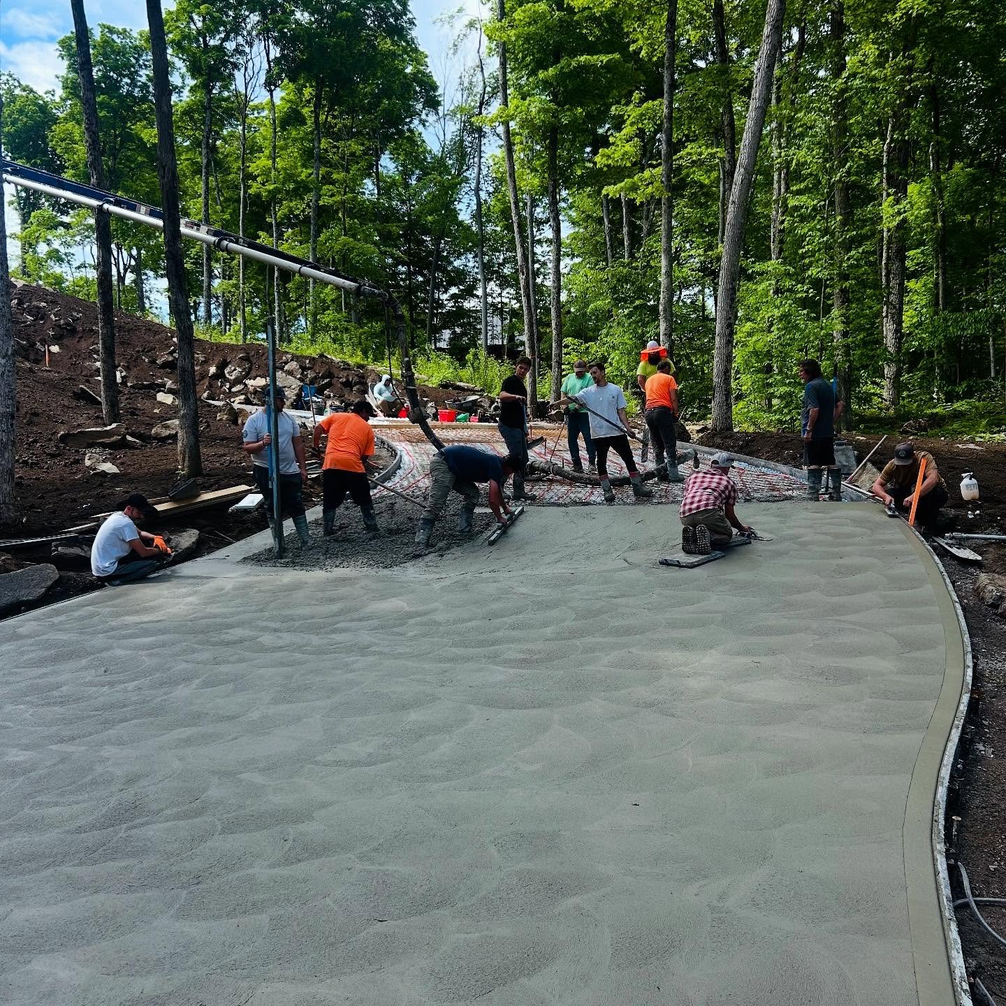 Flawless execution by the dream team. 2nd of 6 pours for this crazy driveway @measured.construction #ottawaconcrete #ontarioconcrete #worldofconcrete