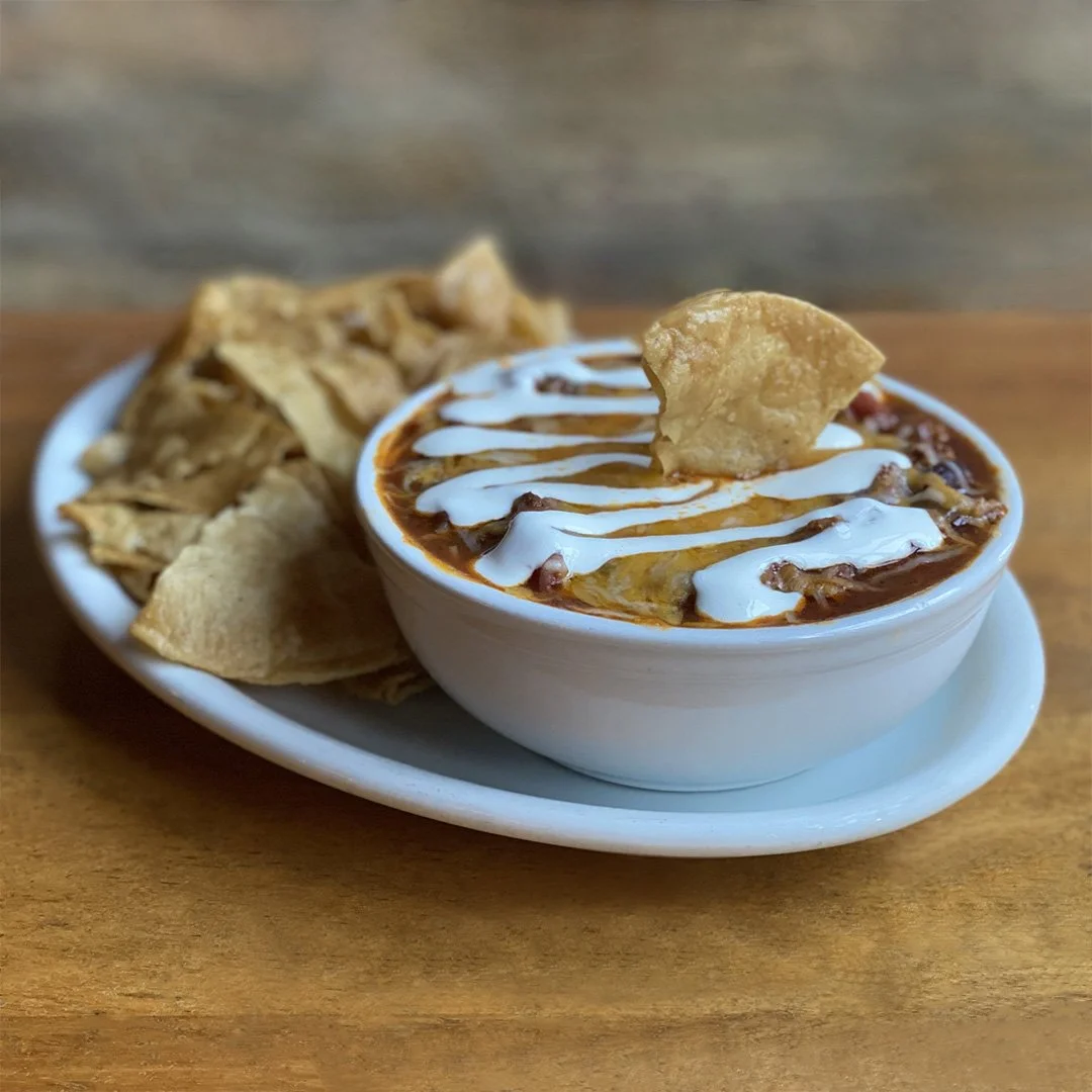 It's a balmy 31&deg; today - but it's still chili weather! Our Baked Three-Way Chili features our signature Seven-Pepper Chili (custom beef blend, seven peppers, onions, kidney beans) topped with cheddar jack and sour cream. Served with tortilla chip