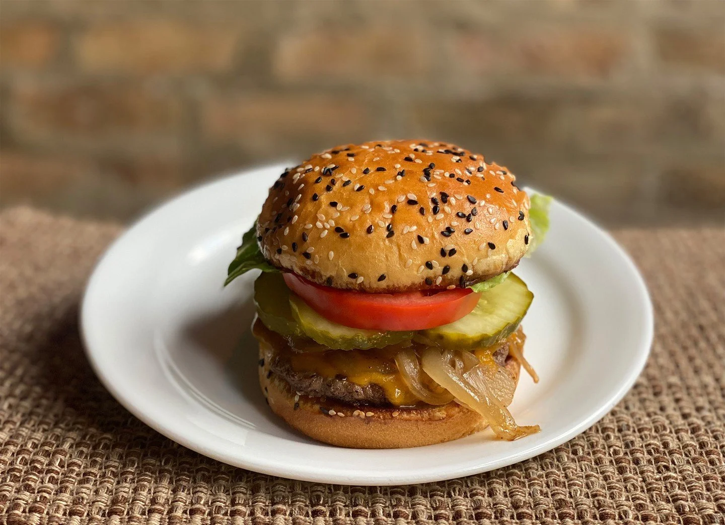 Did you know May is National Hamburger Month? We suggest our Caramelized Onion Smash Griddle Burger.  We start with a custom blended beef patty (chuck, brisket and short rib) and top it with caramelized onions, sharp cheddar, lettuce, tomatoes and di