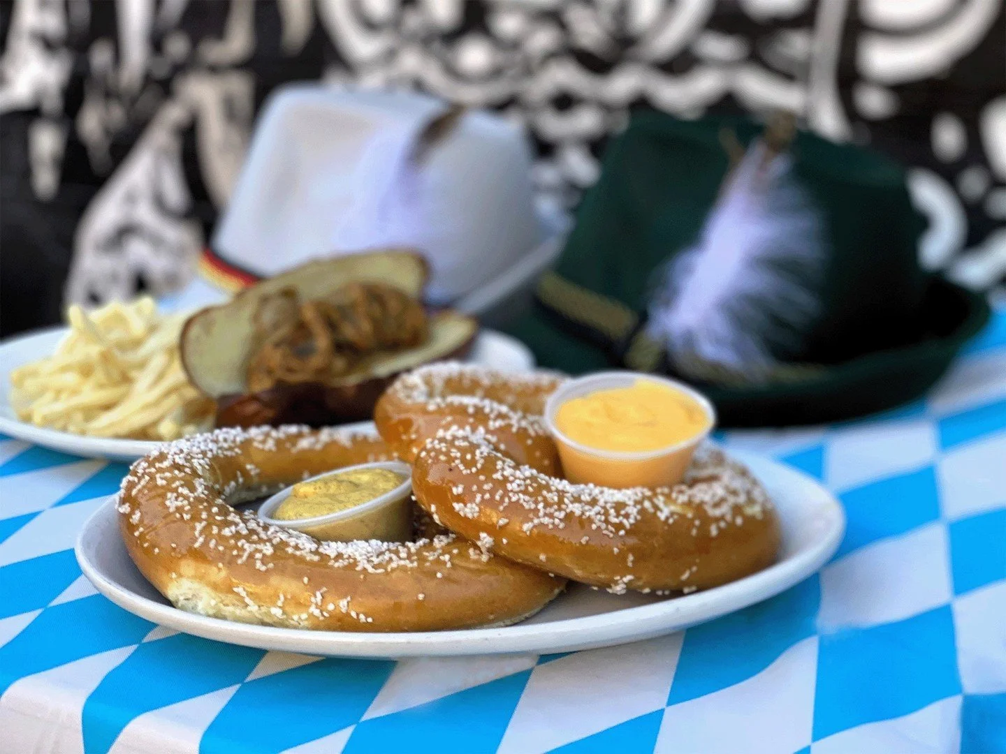 Oktoberfest starts Saturday! Fest fare includes two Soft Pretzel Twists with Cheddar cheese sauce and spicy mustard and a Wood-Grilled Smoked Bacon Cheddar Brat, with caramelized onions and German mustard on a pretzel roll. Oktoberfest tappings inclu
