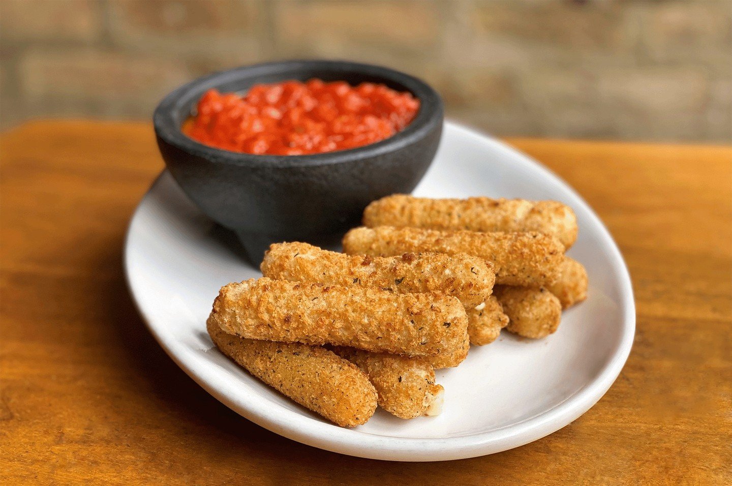 As if you needed an excuse for gooey fried cheese deliciousness - it's National Mozzarella Stick Day! We serve our freshly fried sticks with spicy marinara sauce for dipping. It's NBA opening night and we will be watching the 76ers-Knicks (6 p.m.) an