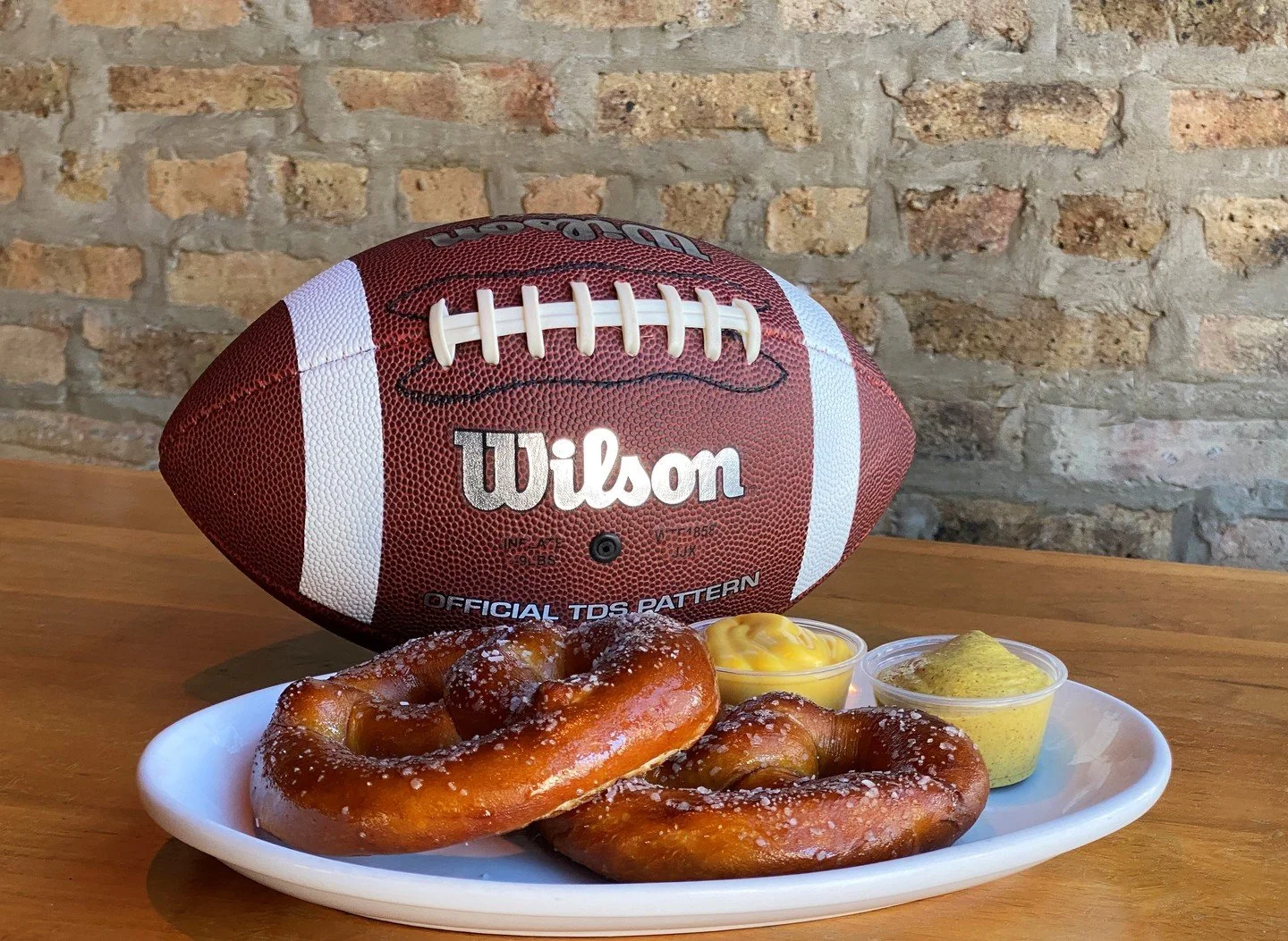 The Bears have the day off, but we still have a ton of football to watch! $12 Miller/Coors pitchers, $5 Skrewball/Fireball shots + our daily deals all day long. Oh yeah - it's also National Pretzel Month and our pretzels score every time. Two soft sa