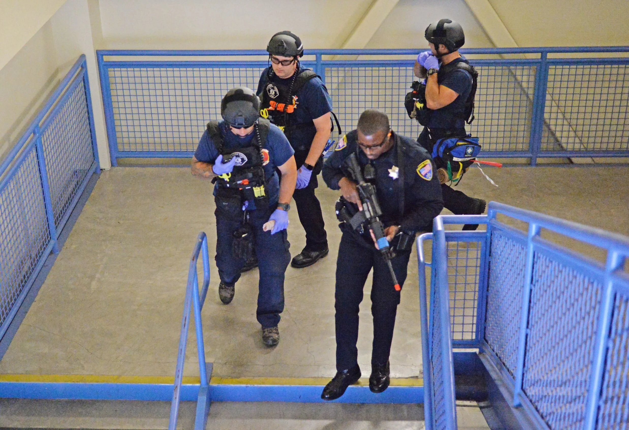 Rescue Task Force ascending stairs during a full-scale active shooter exercise