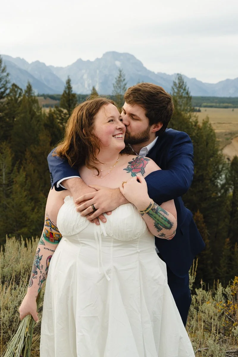 bride and groom at snake river overlook