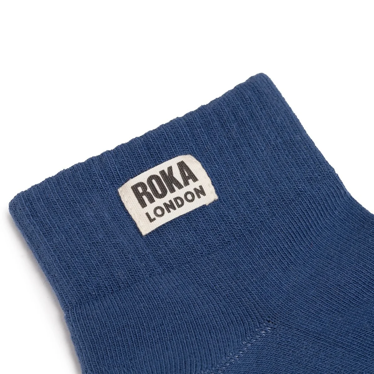 ROKA_WEMBLEY_COASTAL_BLUE_LABEL - Medium.jpg