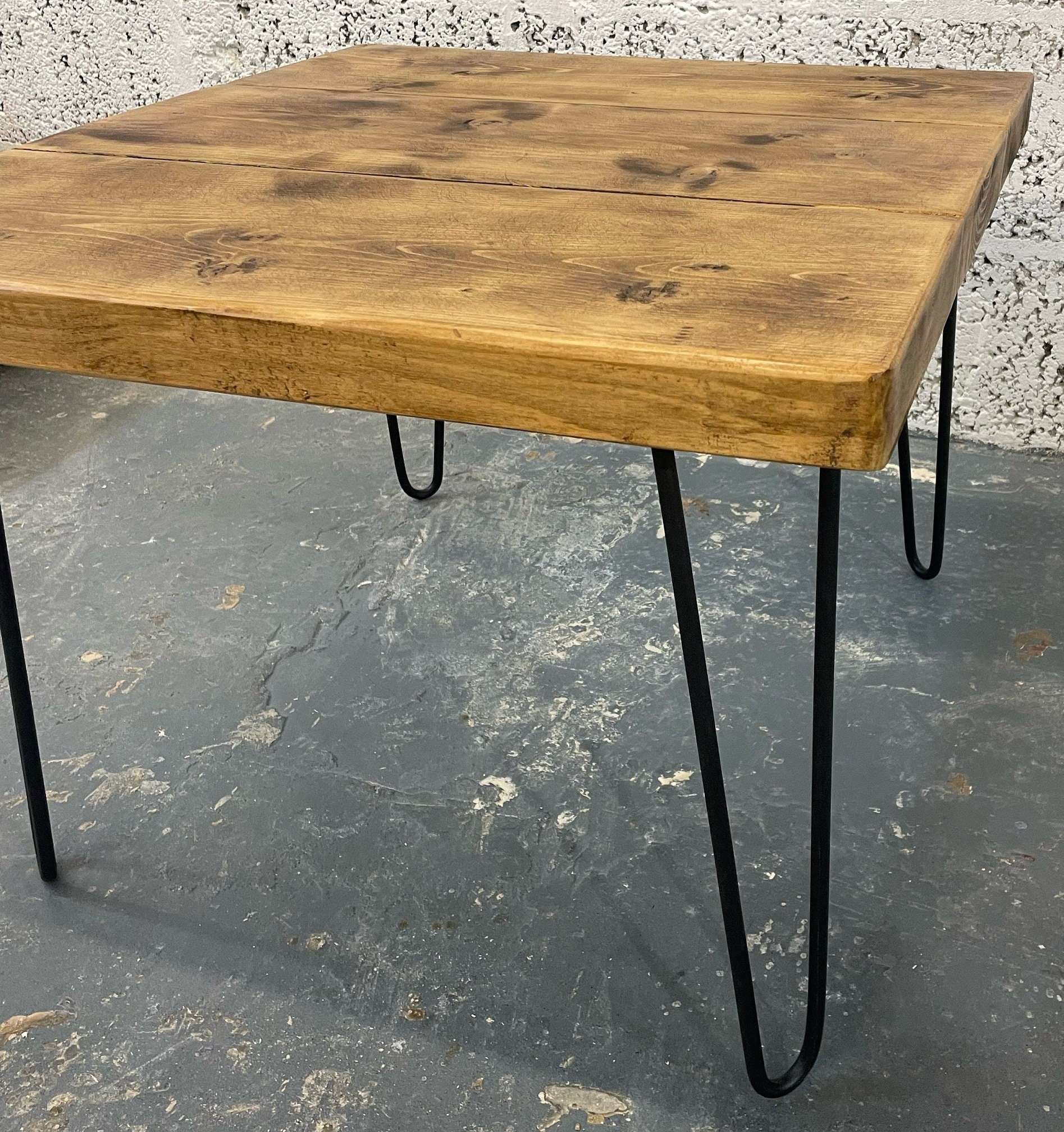 Square rustic industrial coffee table with black hairpin legs in rustic pine dark oak jacobean