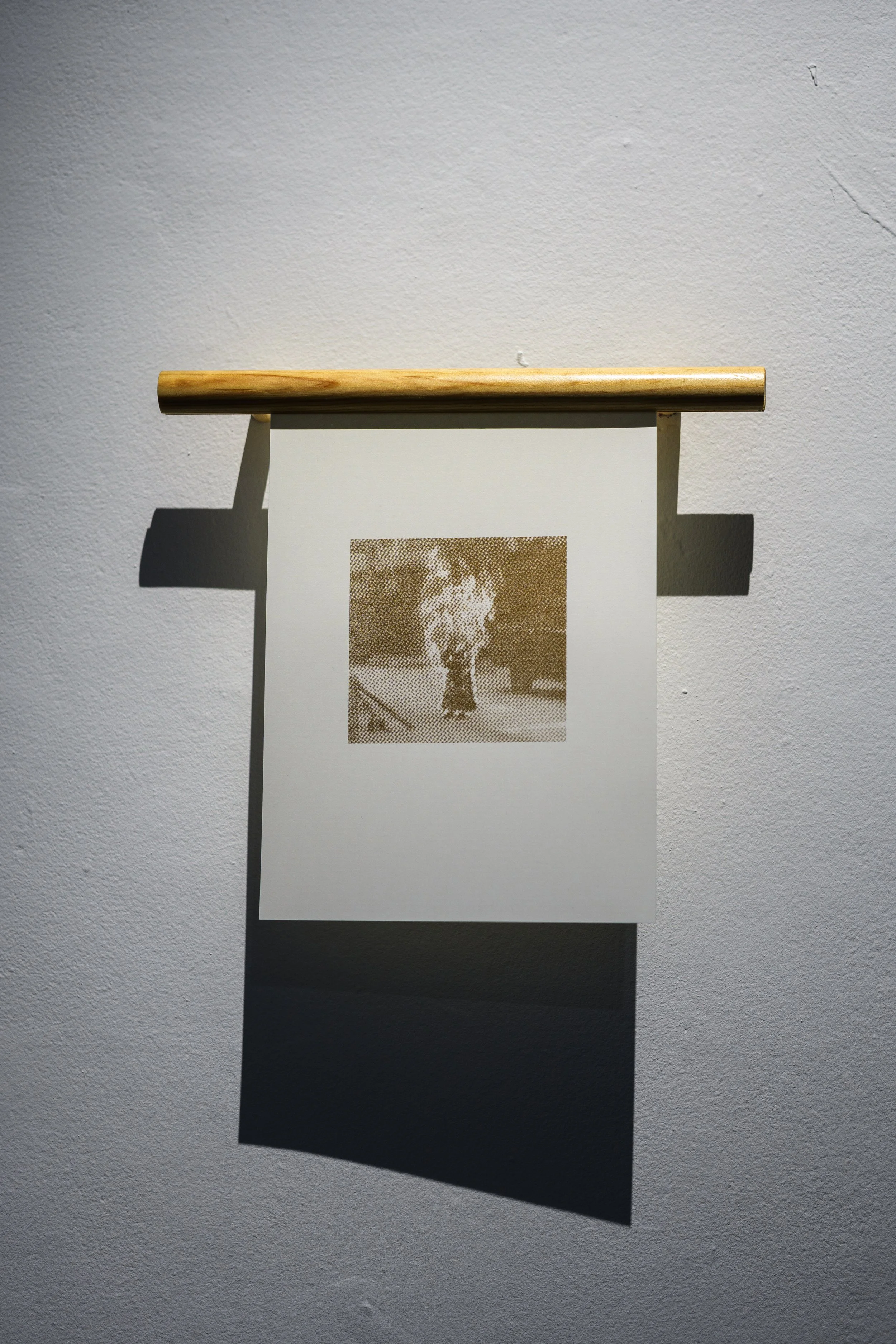  Together in the Atmosphere 1 , 2025, screenprint with gold ink on ivory linen paper, wood hanger. Installation view, ‘The Air We Share’, Galway Arts Centre, Ireland (16 August – 28 September 2025). Photo: Tom Flanagan. 