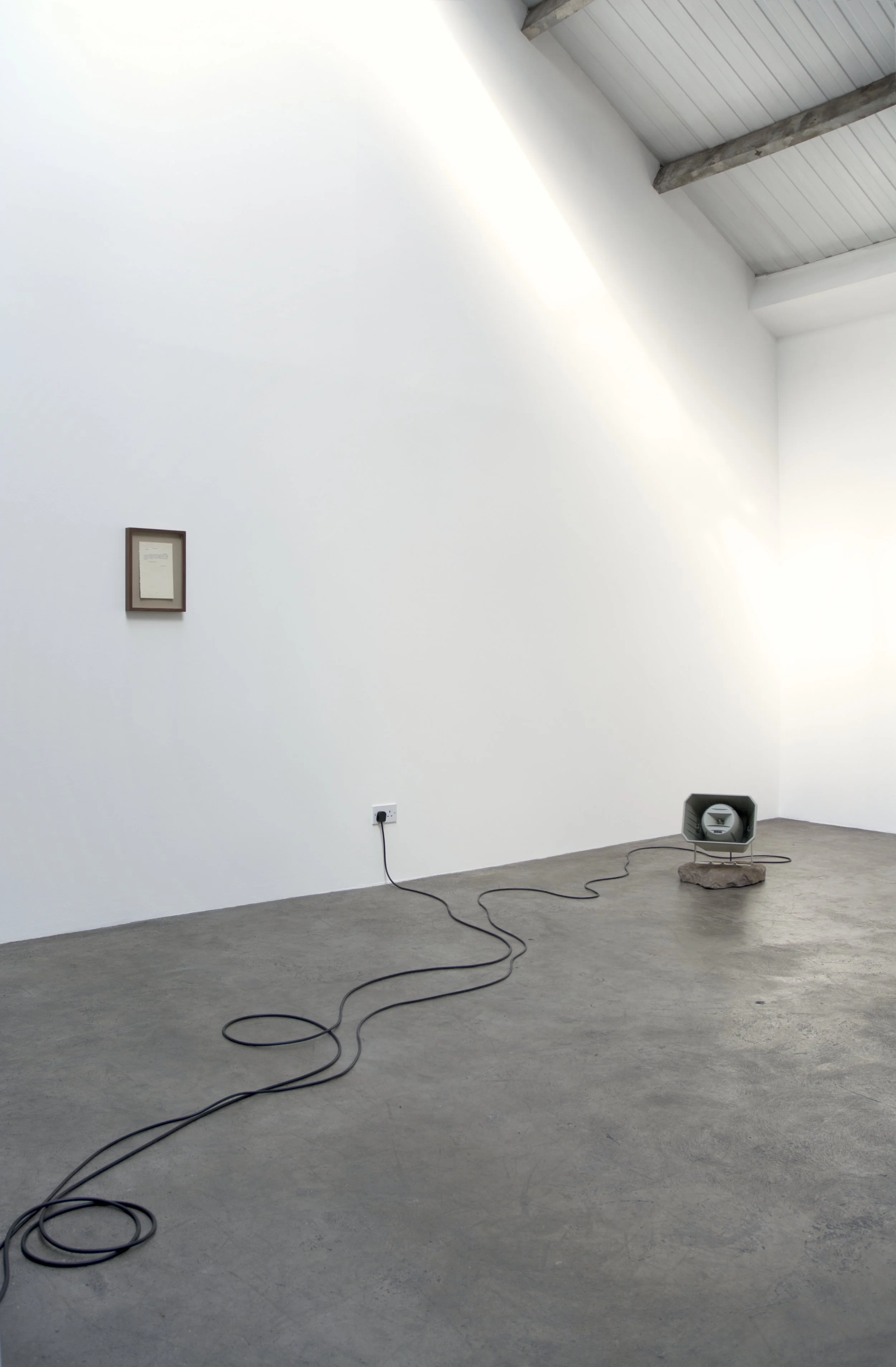 Christopher Steenson, left to right:  Before the Dawn: An Autobiography, 1996, p. 35 , 2024, screenprinted text excerpt from book, printed on book endpaper. Edition of 3 + 2 AP; detail from The Long Grass, 2022–24, horn speaker, carved field stone, c