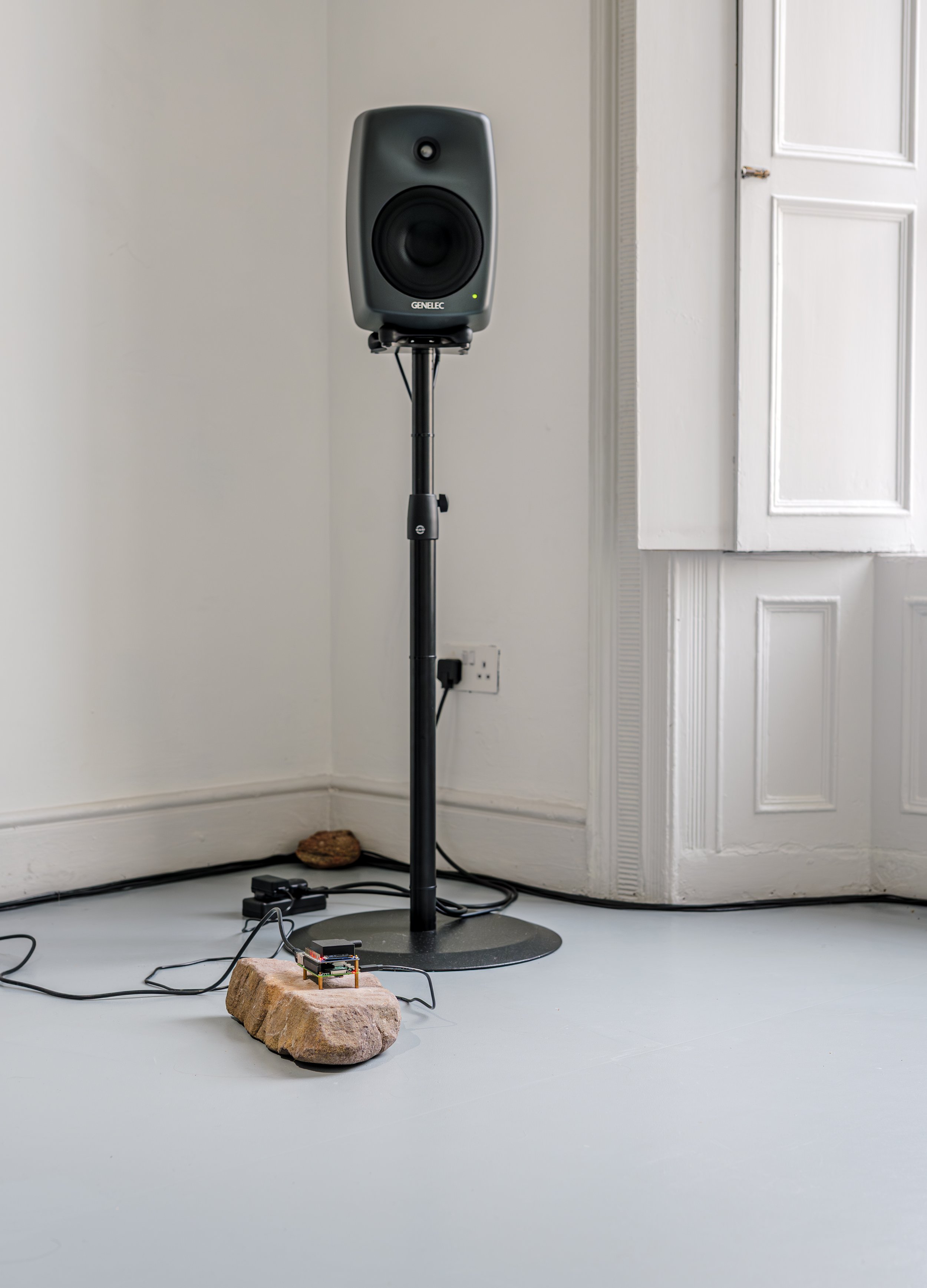  Where Does the Body End? , 2025, air quality sensor, singing bowls, chrome-plated pedestal fan, wood, carved stone, 3D-printed components, five-channel sound, custom software, Raspberry Pi microcomputers, Arduino microcontrollers, motors, circuitry,