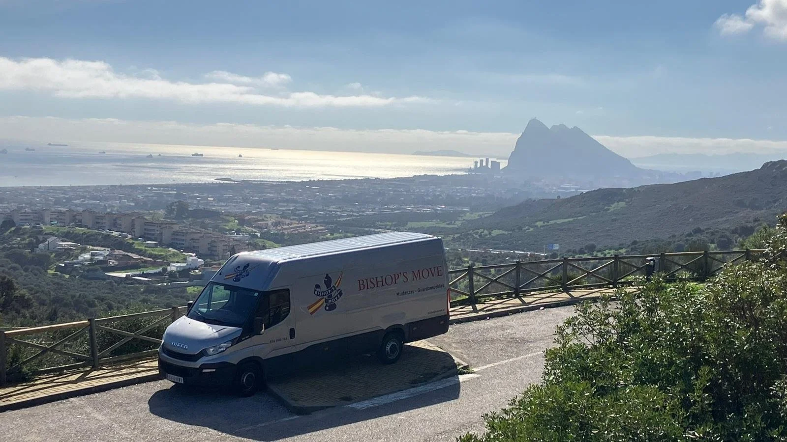 A Bishop's Move Spain removals van with view of the Rock of Gibratlar behind it