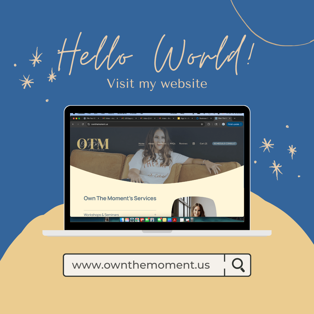 Laptop displaying Own The Moment website: Hello World! Visit my business coach site at www.ownthemoment.us.