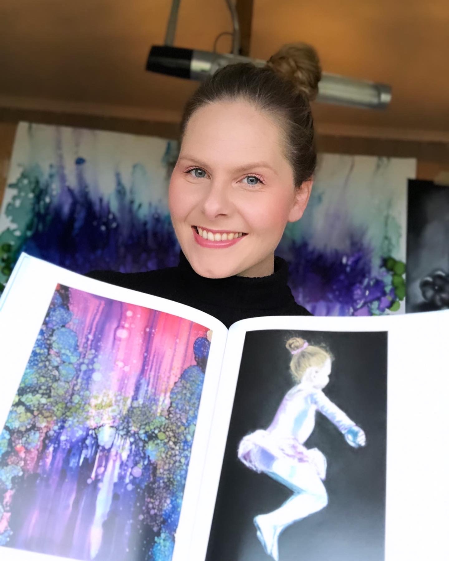 Holding Nordic Art Guide showing my works_Thea Kiaer.jpg