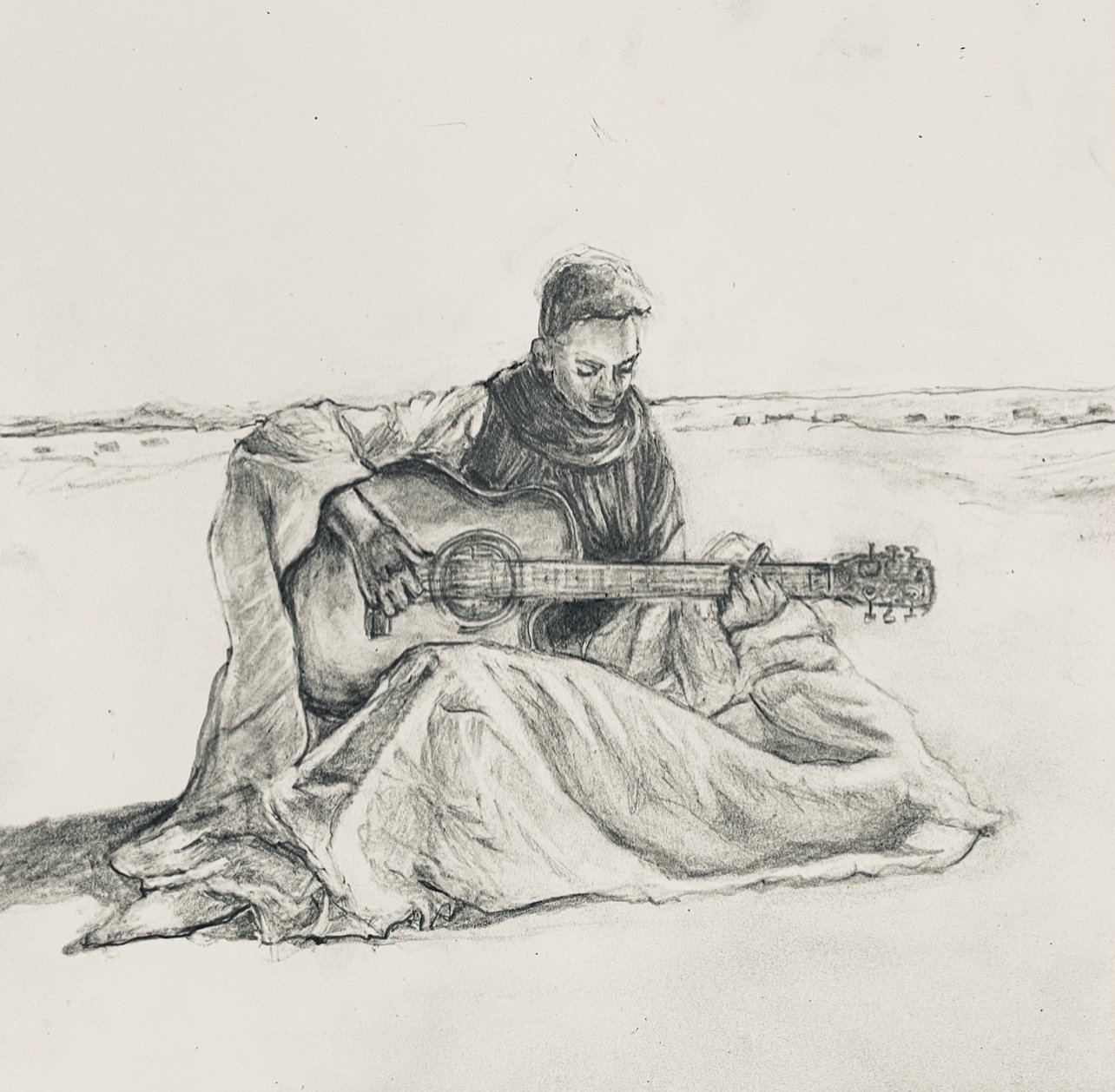  A guitarist in the Sahara