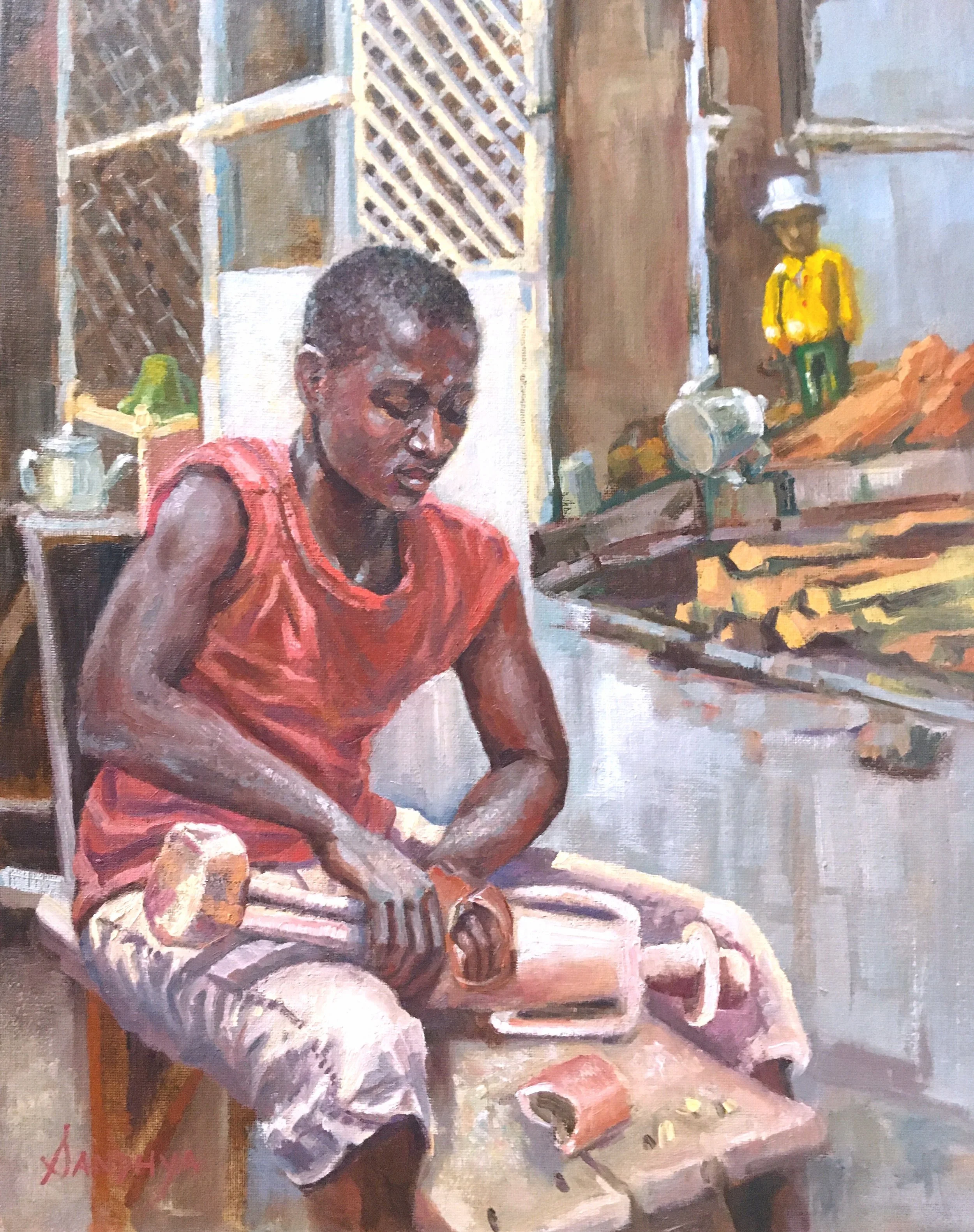 Woodcarver of Abidjan300.jpg