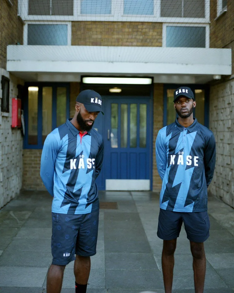 KÄSE - BLACK HYBRID CAP + FOOTBALL TOP