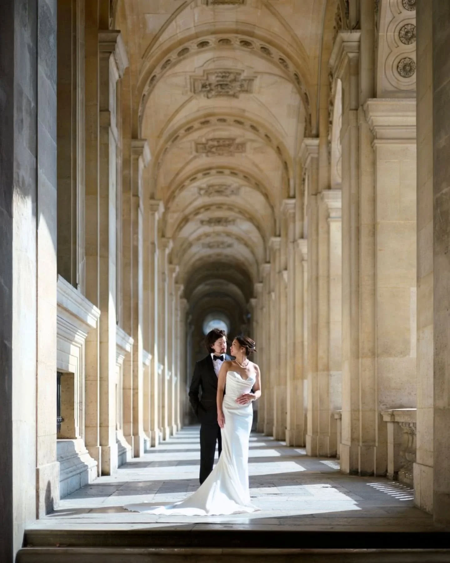 From Palais Royal arcades to the Louvre courtyard, L &amp; M kept it modern, intimate, and unmistakably chic.

Bride dress: @glambynanie
Makeup artist: @alesiasolo.co
Hairdresser: @asmasters.co
Groom's suit: @suitsupply

#editorialweddingphotographer