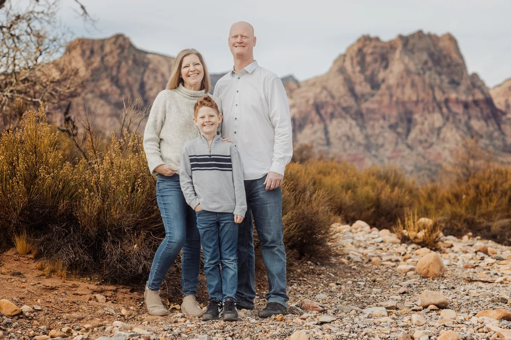Family in coordinated earth-tone clothing at Red Rock Canyon