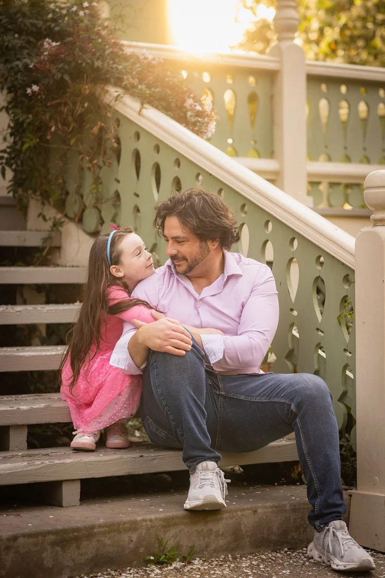 Father and daughter sharing a quiet moment during a Las Vegas family portrait session