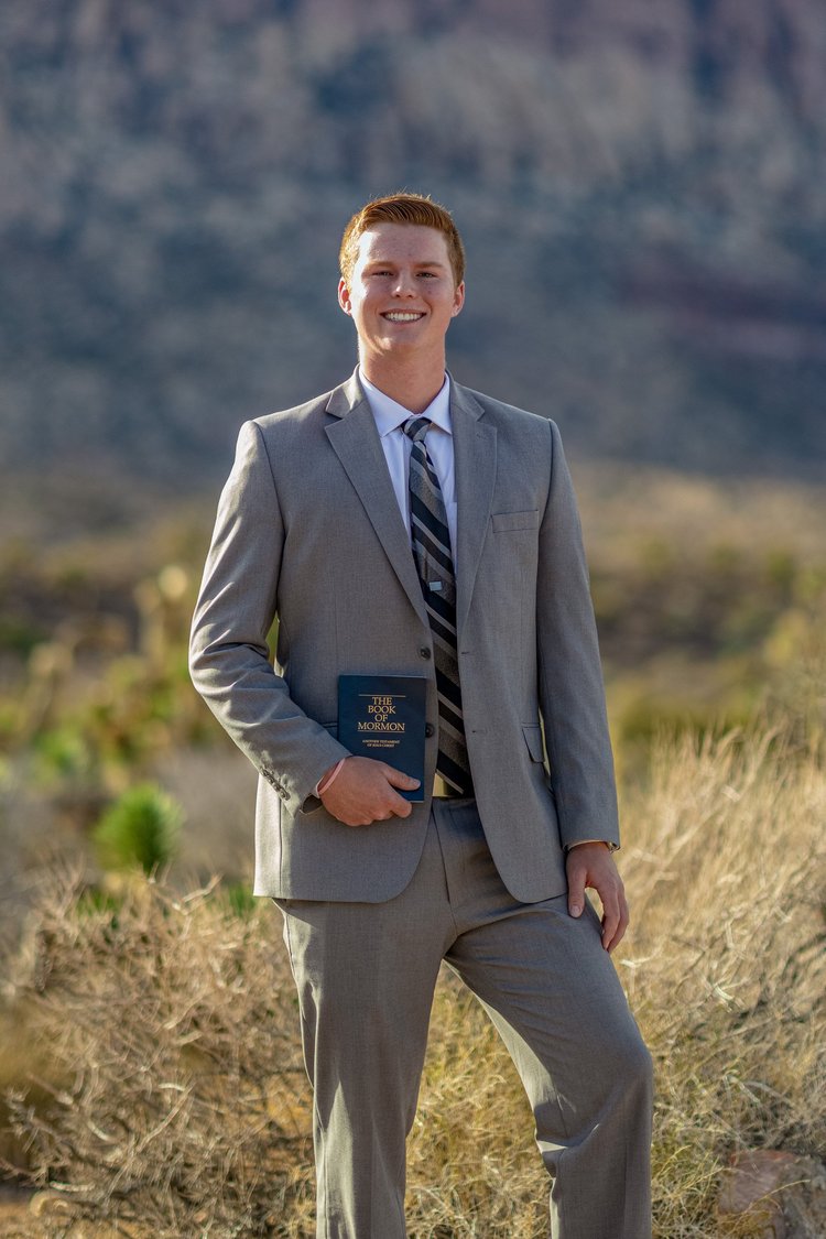 Man in a grey suit photographed on location at Red Rock Canyon near Las Vegas
