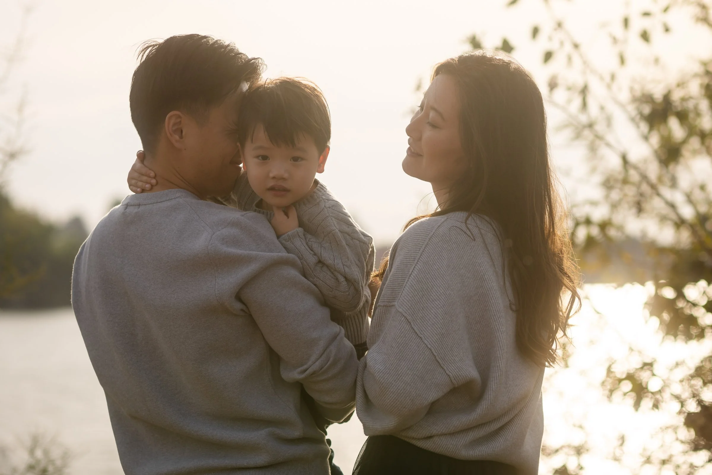Las Vegas family photographer, parents and young son at golden hour