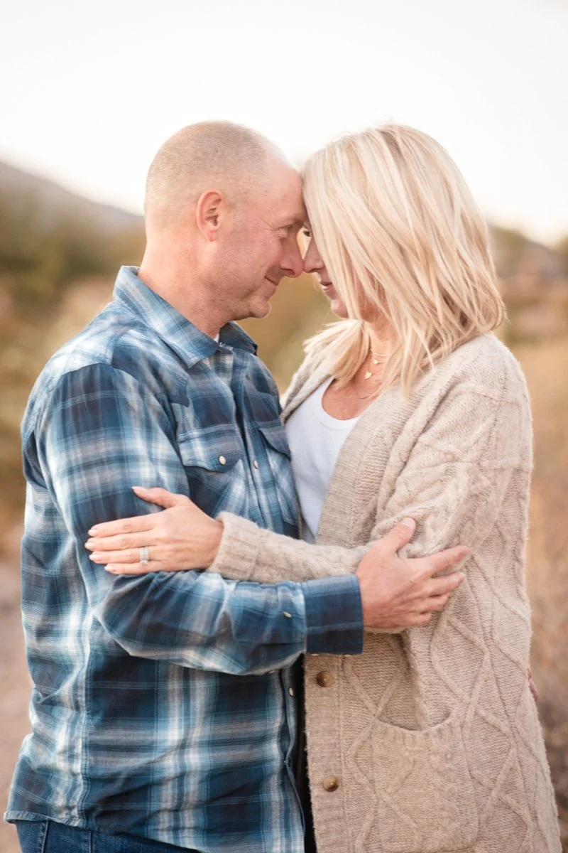 Couple embracing during an outdoor Las Vegas portrait session