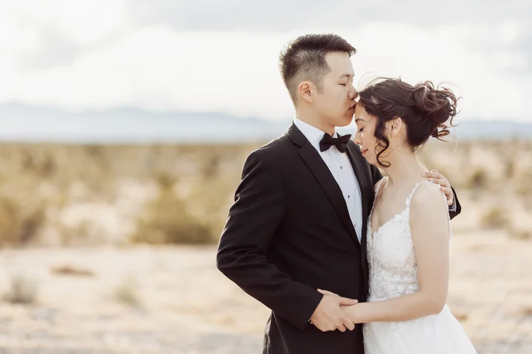 Newly married couple close together after a Kyle Canyon ceremony
