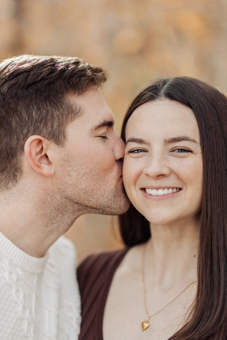 Couple laughing during an engagement session at Red Rock Canyon
