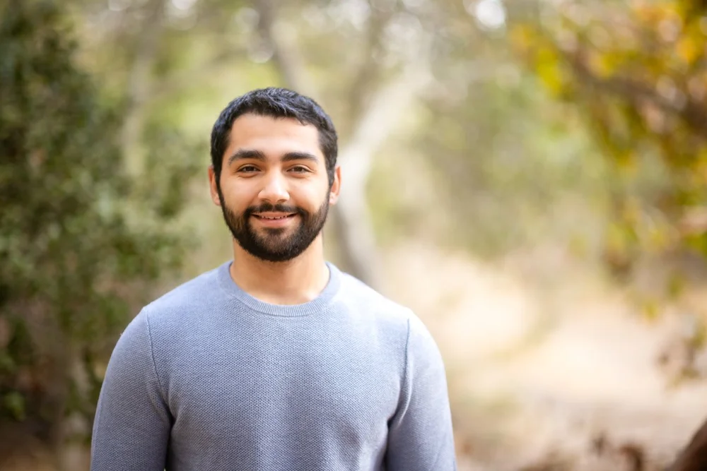 Outdoor professional headshot of a smiling man in Las Vegas