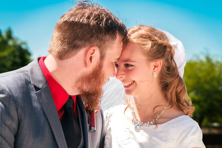 Newly married couple close together after a small Las Vegas wedding ceremony