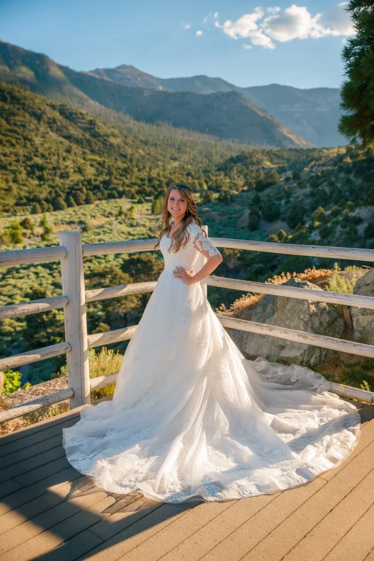 Bride on a wooden overlook above the pines at Mount Charleston