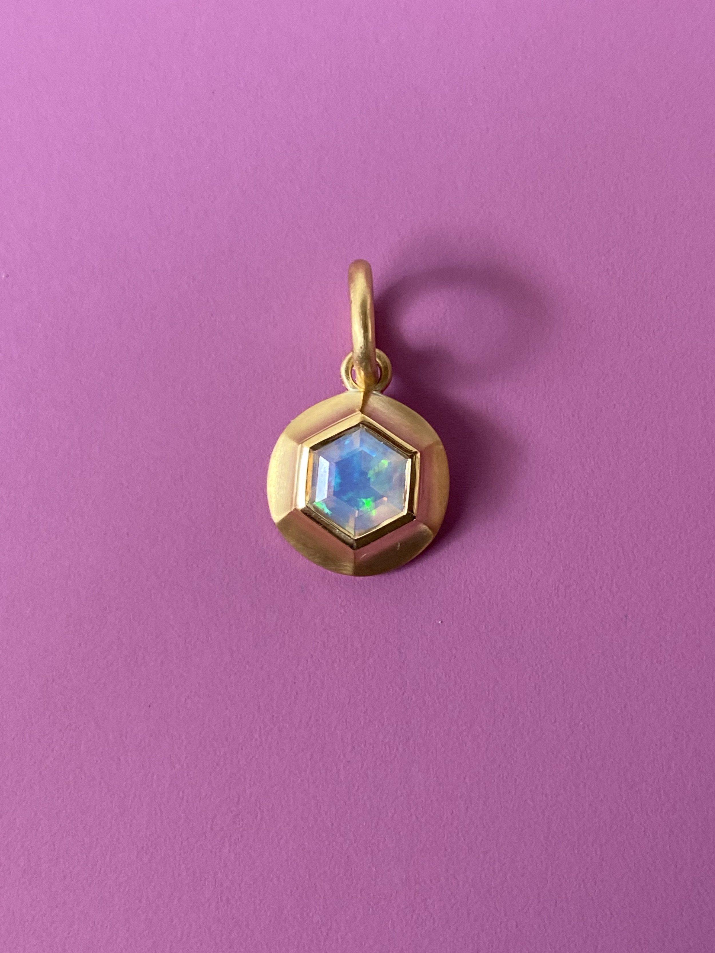 small opal charm handmade 22k gold fairmined gold ethically sourced.jpeg