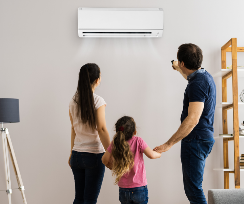 Outdoor air conditioning unit installed on the exterior wall of a building.