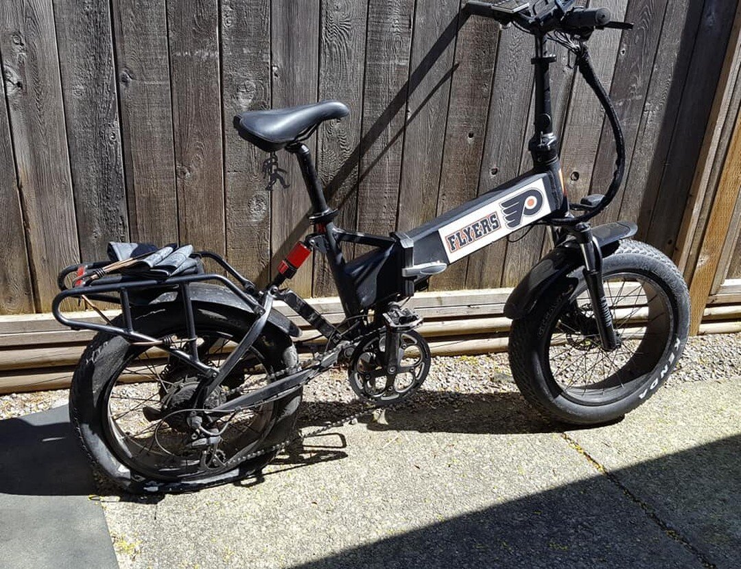 I worked on this Synergy Kahuna E-bike for my friend Ray Havelock  today.  As a bike mechanic, I was a little excited to work on an E-bike.  As a Habs fan, I was a little insulted with the Flyers logos.