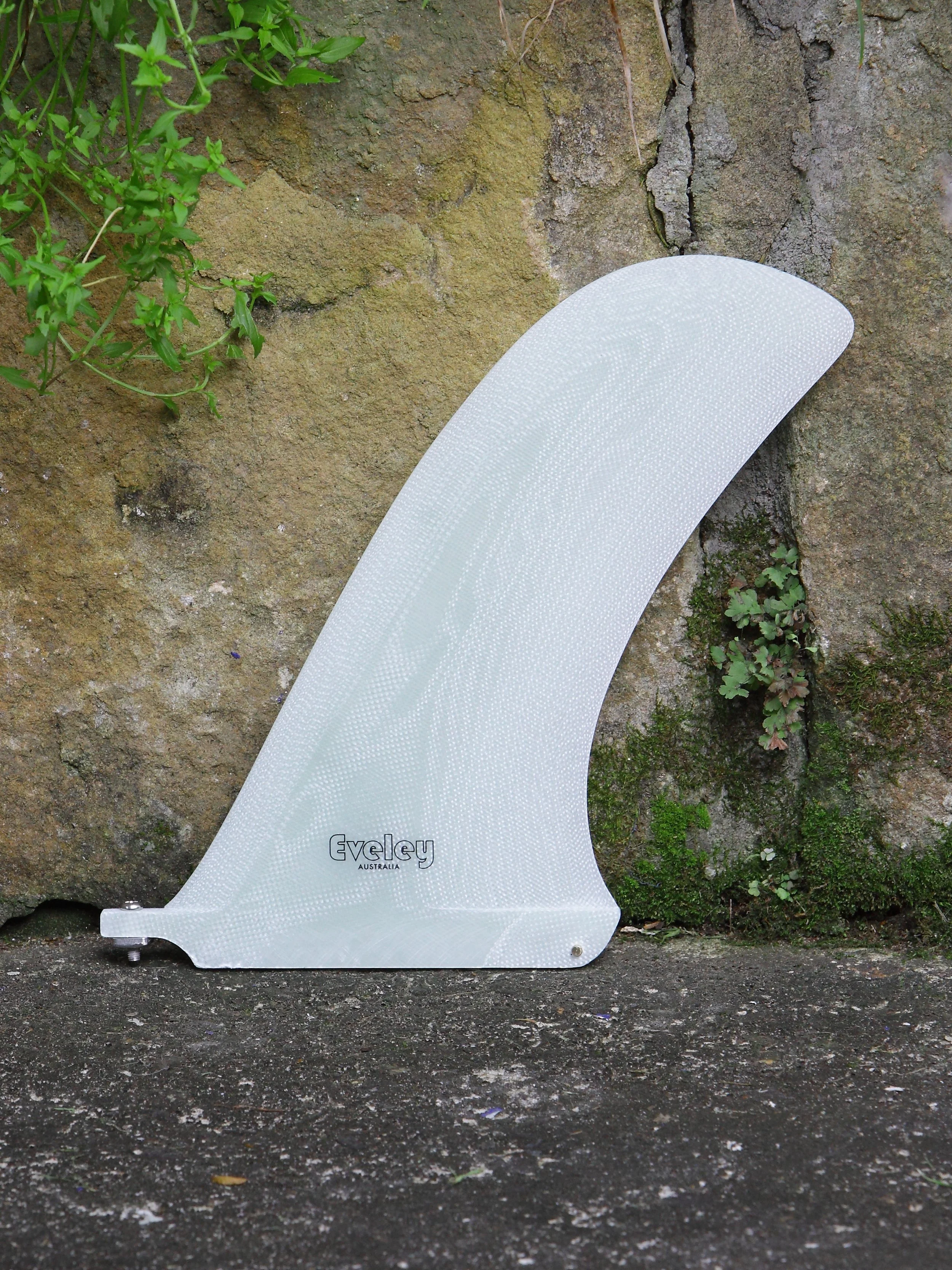 Natural translucent volan Eveley Santa Monica longboard centre fin with 10-inch depth and 6.9-inch base