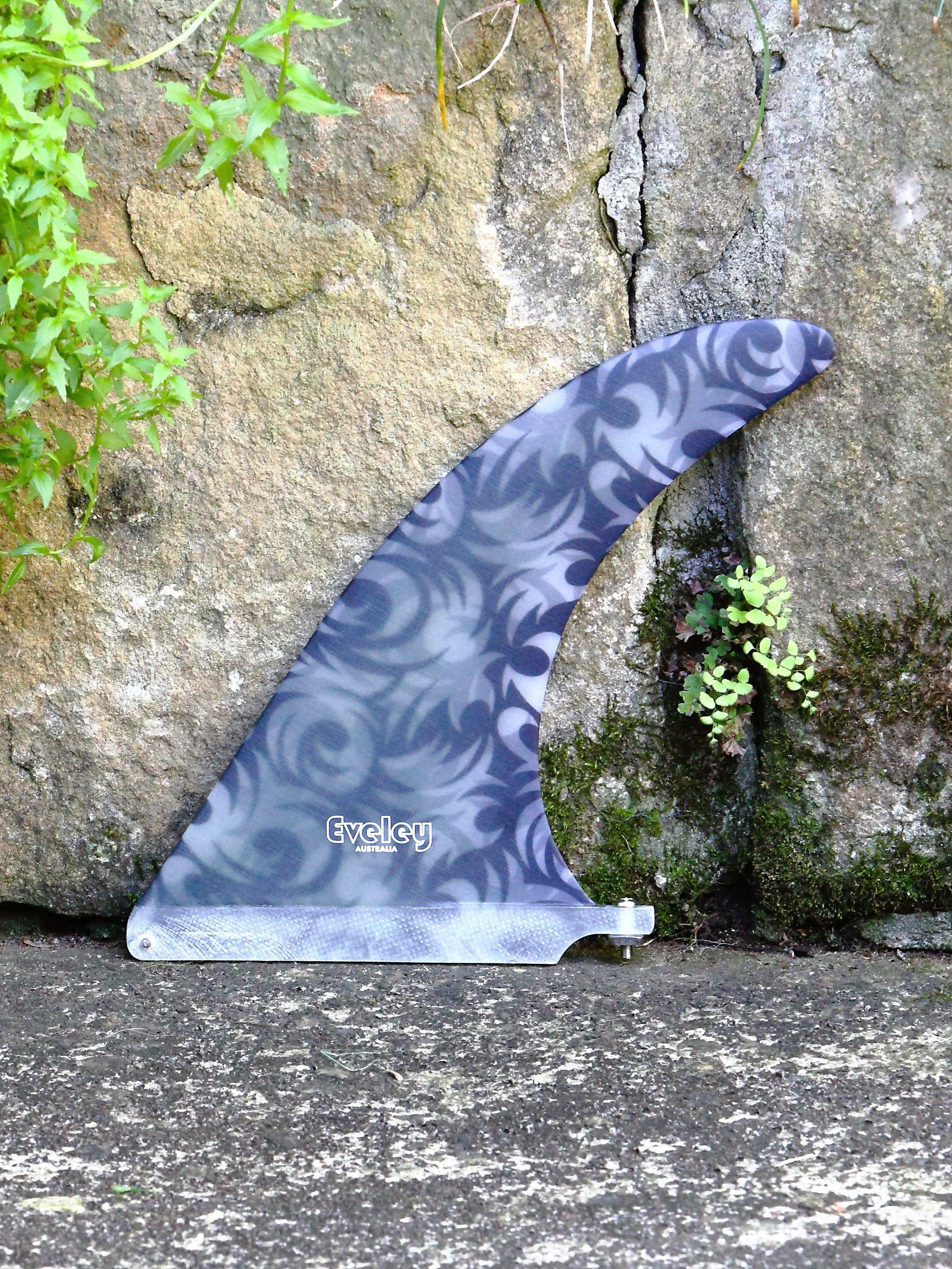 9" International 4A Center Fin with an irregular black inlaid pattern in Pro Glass