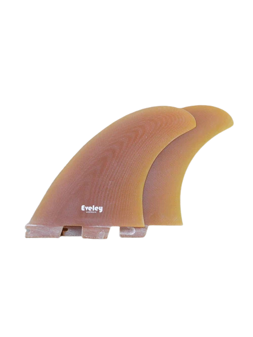 Pair of Eveley 5.5-inch Power Twin surfboard fins in translucent Gold Pro Glass with FCS II compatible dual tabs.