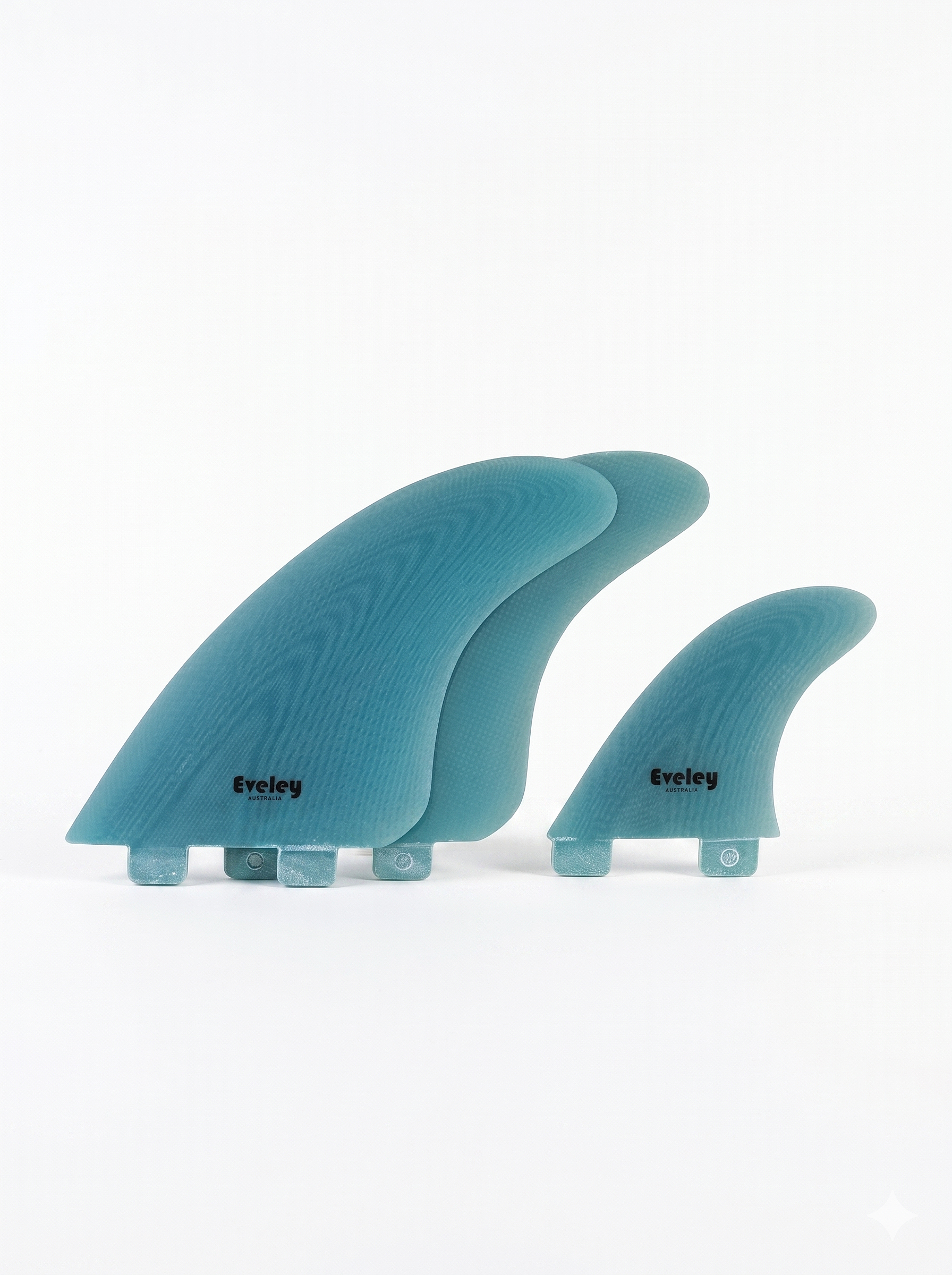 5.5" Balanced Twin Fins plus 3.5" Stabilizer, blue Pro Glass. FCS compatible set of three fins.